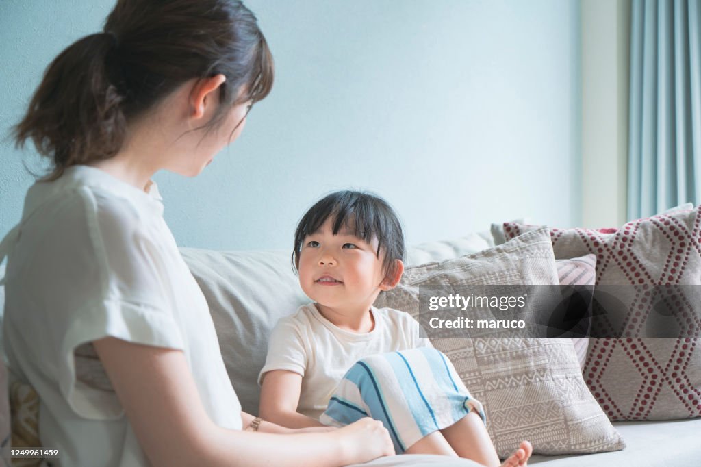 Parent and child on the sofa
