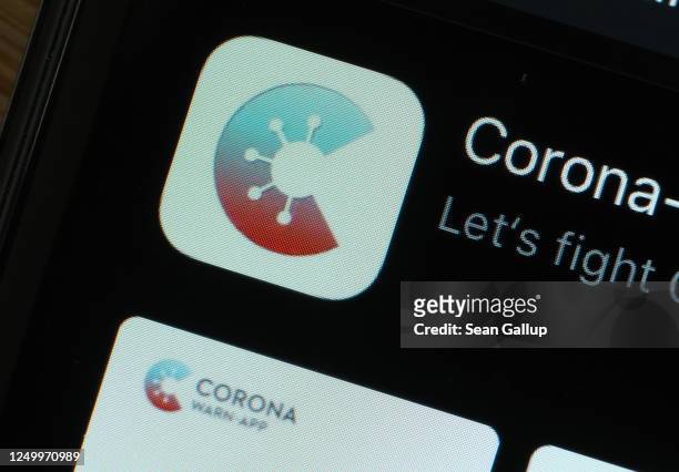 The newly-released "Corona-Warn-App" developed by the German government for tracing Covid-19 infections is seen for download on an Apple iPhone...