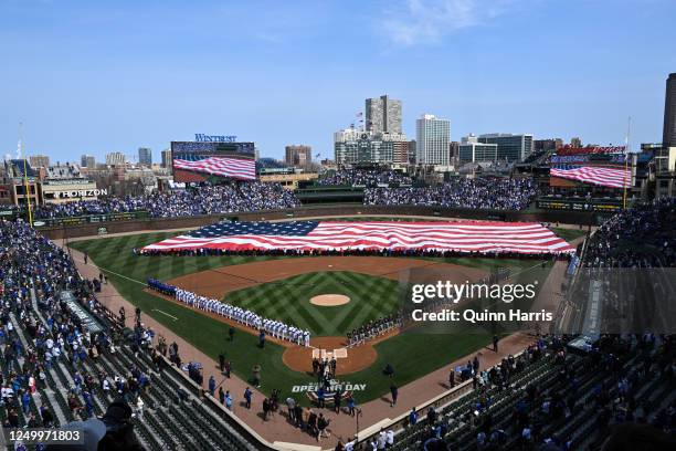 General view of Wrigley Field during the national anthem before the game between the Milwaukee Brewers and the Chicago Cubs at Wrigley Field on...