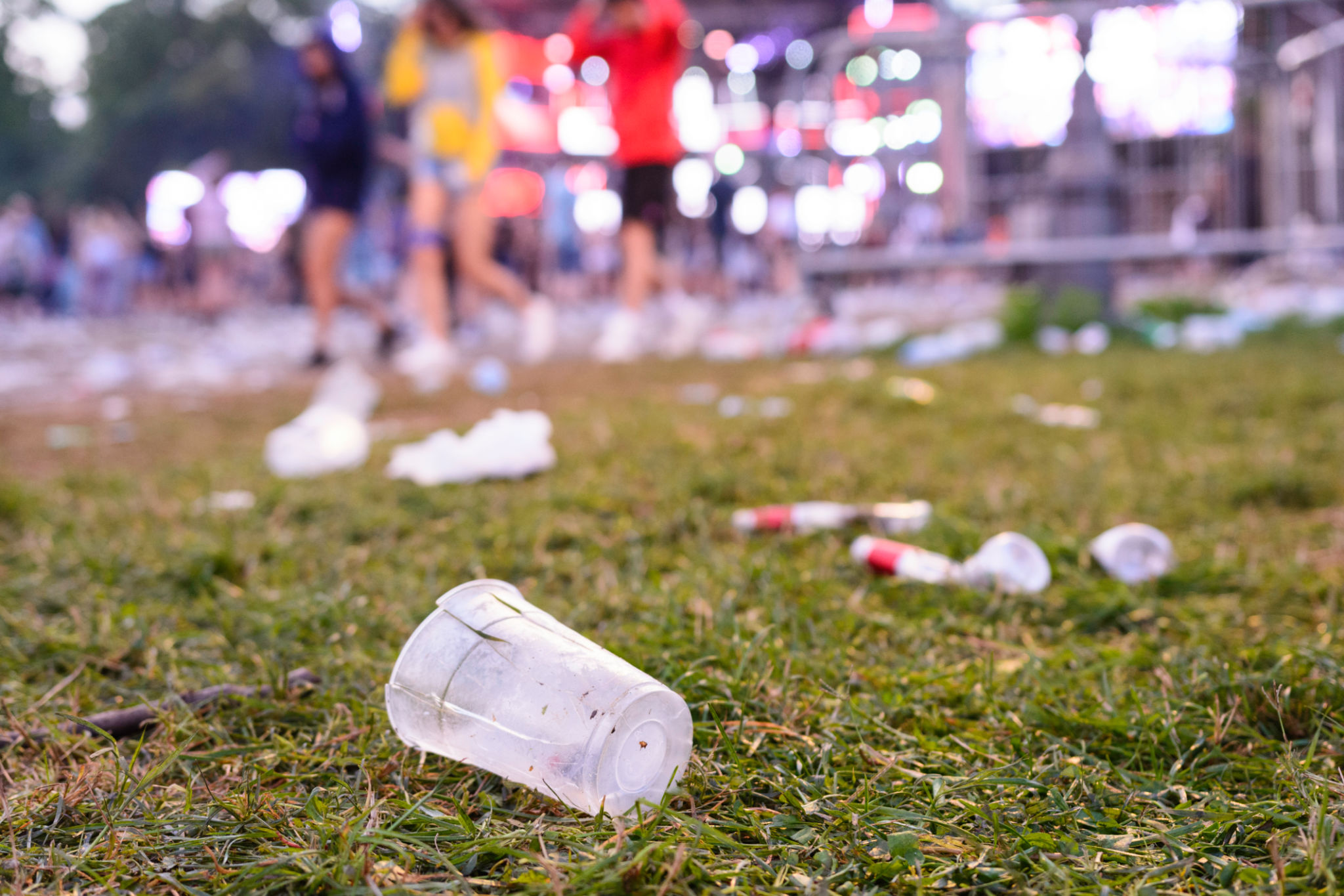 After party - empty glasses and garbage on the ground After party - empty glasses and garbage on the ground