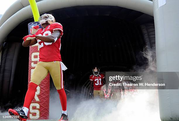 Madieu Williams of the San Francisco 49ers walks on to the field during player introduction before his NFL football game against the Seattle Seahawks...