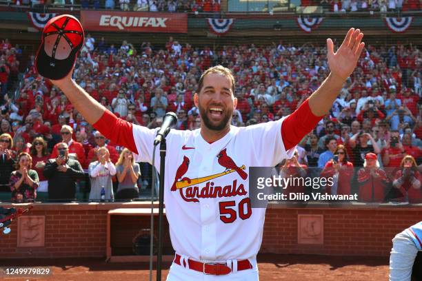 Adam Wainwright of the St. Louis Cardinals sings the national anthem prior to the game between the Toronto Blue Jays and the St. Louis Cardinals at...