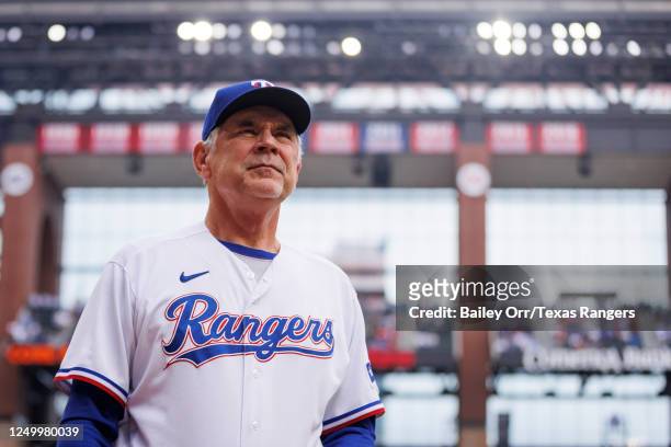 Manager Bruce Bochy of the Texas Rangers looks on prior a game against the Philadelphia Phillies on Opening Day at Globe Life Field on March 30, 2023...