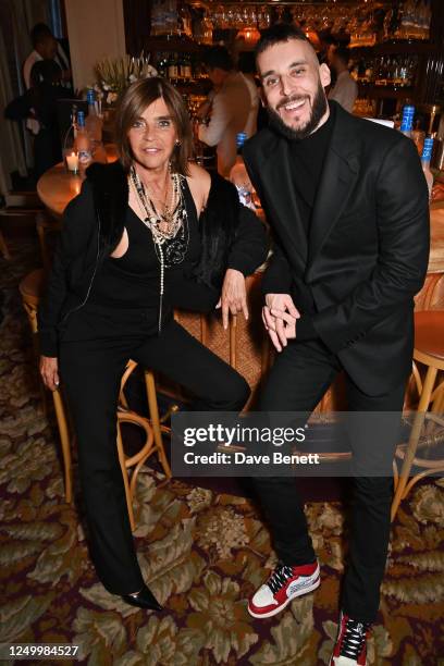 Carine Roitfeld and Vladimir Restoin Roitfeld attend the Grey Goose x Carine Roitfeld Fashion Book Dinner at the Chiltern Firehouse on March 30, 2023...