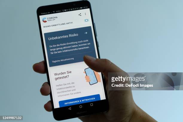In this photo Illustration, The main page of the Corona Warn app is seen on an Android platform on June 16, 2020 in Dortmund, Germany.