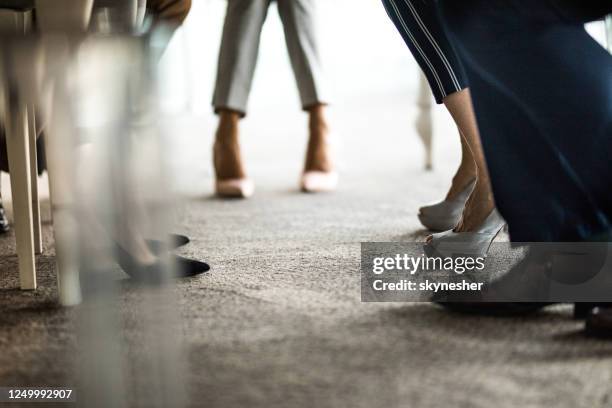 unrecognizable business people's legs on a meeting in the office. - office carpet stock pictures, royalty-free photos & images