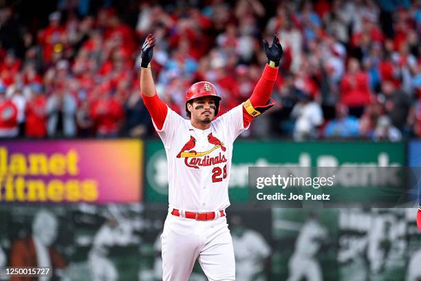 Nolan Arenado of the St. Louis Cardinals reacts after hitting a ground rule double which scored two runs against the Toronto Blue Jays in the eighth...