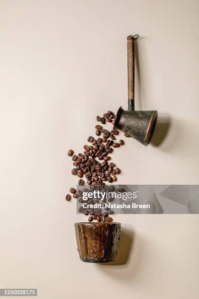 pouring coffee beans - pouring cereal stock pictures, royalty-free photos & images