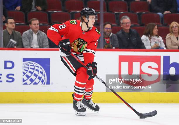 Chicago Blackhawks defenseman Alex Vlasic controls the puck during a game between the St.Louis Blues and the Chicago Blackhawks on March 30, 2022 at...