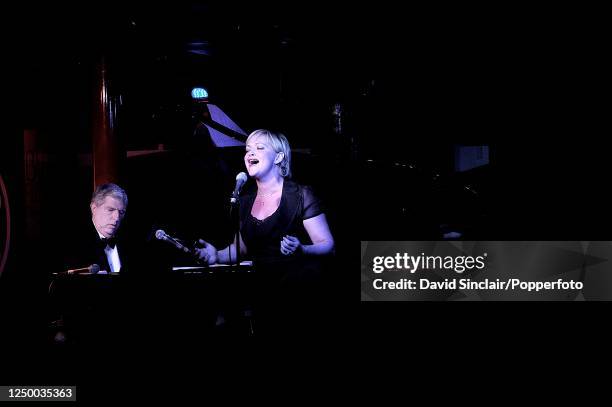 Singer and actress Maria Friedman performs live on stage with American pianist Marvin Hamlisch at PizzaExpress Jazz Club in Soho, London on 10th...
