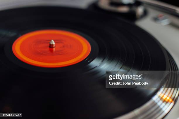 record spinning on record player - vintage record player no people stock-fotos und bilder