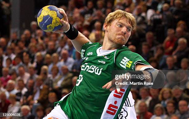 Manuel Spaeth of Goeppingen throws the ball during the Toyota Handball Bundesliga match between THW Kiel and Frisch Auf Goeppingen at the Sparkassen...