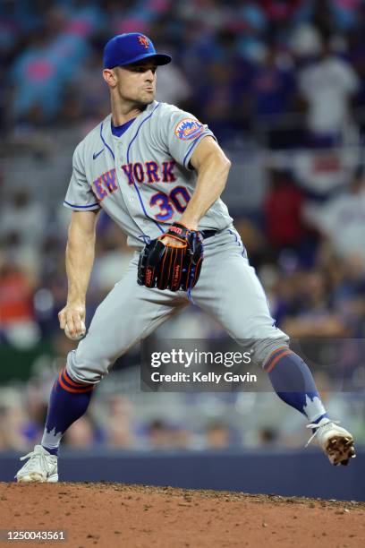 David Robertson of the New York Mets pitches in the ninth inning during the game between the New York Mets and the Miami Marlins at loanDepot park on...