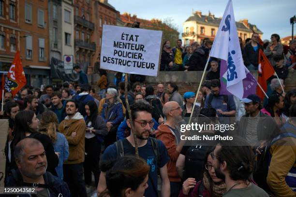 Protester is holding a placard reading ''Liar State, Police State, Destruct-Killer'' in Toulouse, France, on March 30th, 2023. After the violence at...