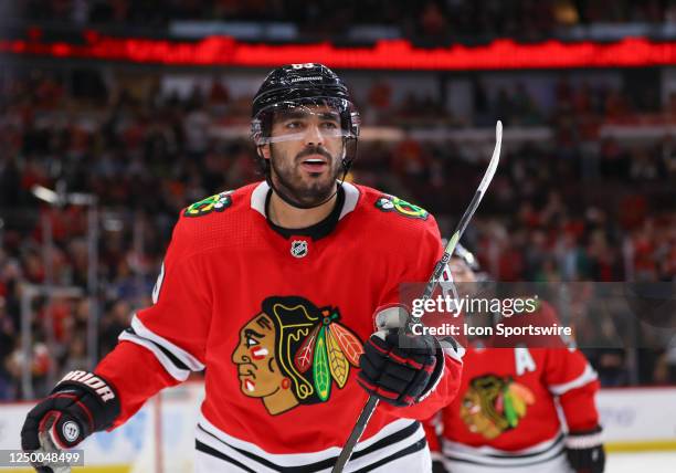 Chicago Blackhawks center Andreas Athanasiou skates back to the bench after scoring a goal during a game between the St.Louis Blues and the Chicago...