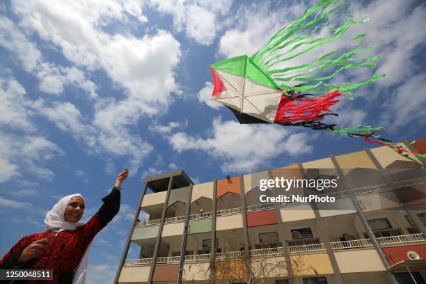 Palestinian student flies a kite during the 47th annual Land Day demonstration in Gaza City on March 30, 2023.