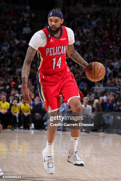 Brandon Ingram of the New Orleans Pelicans dribbles the ball during the game against the Denver Nuggets on March 31, 2023 at the Ball Arena in...