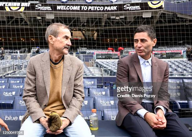 San Diego Padres chairman Peter Seidler, left, talks with general Manager A.J. Preller during batting practice on opening day of the 2023 Major...