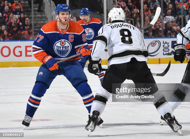 Connor McDavid of the Edmonton Oilers and Drew Doughty of the Los Angeles Kings skate during the game on March 30, 2023 at Rogers Place in Edmonton,...