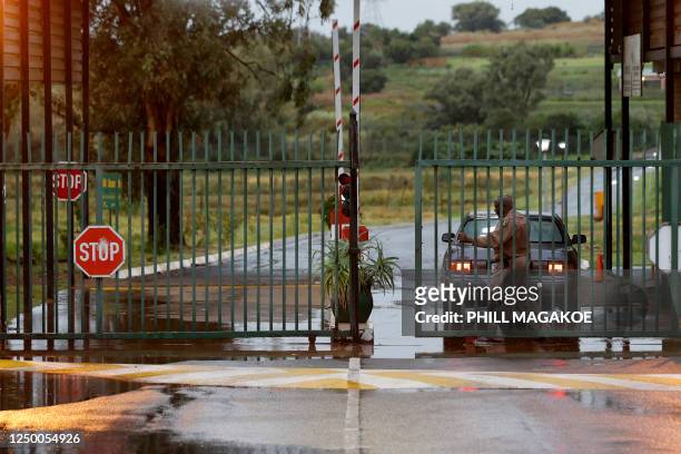 Correctional Services Officer closes the gate at the Atteridgeville Correctional Centre in Pretoria on March 31, 2023. - South African Paralympic...