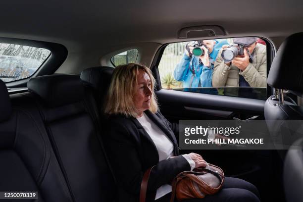 The mother of Reeva Steenkamp, June Steenkamp arrives at the Atteridgeville Correctional Centre in Pretoria on March 31, 2023. - South African...