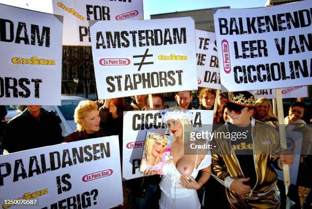 Former Italian pornstar and politician Ciccolina , poses on the Plein in front of the Parlaiment in The Hague as she shows her trademark naked...