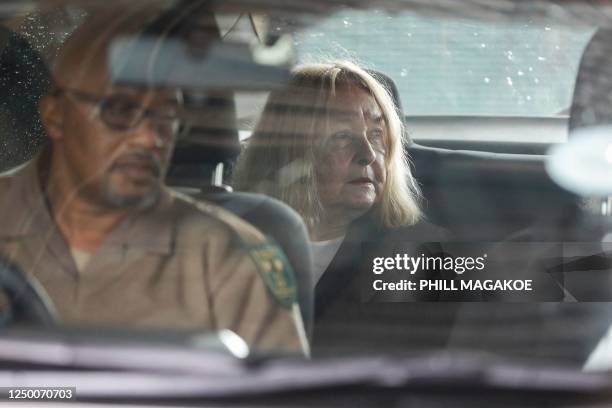 The mother of Reeva Steenkamp, June Steenkamp sits inside a Correctional Services vehicle as she arrives at the Atteridgeville Correctional Centre in...