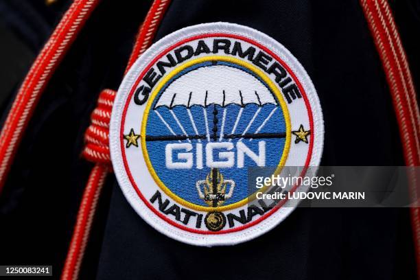 Photo shows a badge on a uniform of the GIGN during ceremony in tribute to French GIGN gendarme Marechal des Logis-Chef Arnaud Blanc, who was killed...