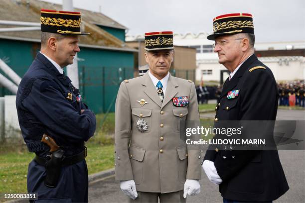 Commander General Ghislain Rety, French Chief of the Defence Staff General Thierry Burkhard and National Gendarmerie Director-General Christian...