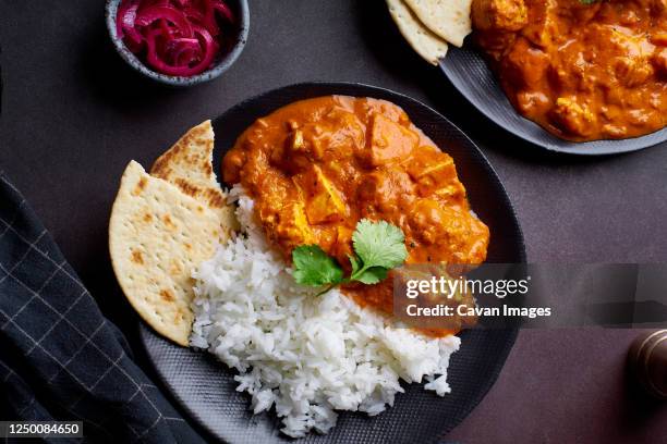 paneer tikka masala served with basmati rice - masala fotografías e imágenes de stock