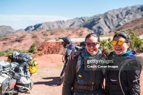 portrait of two women near touring motorbikes, salta, argentina - salta provincie stockfoto's en -beelden