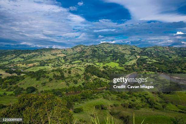 scenic view of meandering river in columbia - pereira stock-fotos und bilder