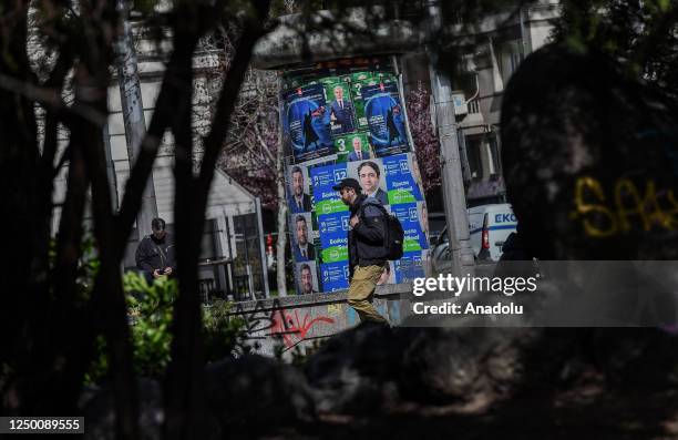 Man walks past an elections campaign posters in Sofia, Bulgaria 31 March 2023. Bulgaria will hold an early parliamentary election on 02 April 2023.