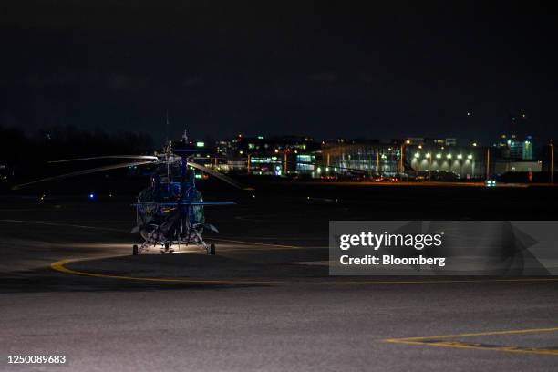 Grounds grew roll out a Helijet helicopter from the hanger at Vancouver International Airport in Richmond, British Columbia, Canada, on Thursday,...