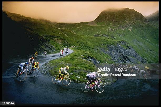 General view as riders descend a hill during the 202 kilometre stage seven of the 83rd Tour de France from Chambery to Les Arcs. Mandatory Credit:...