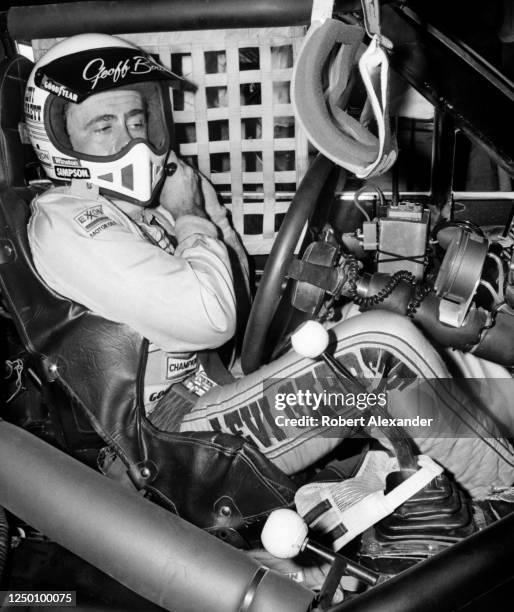 Driver Geoff Bodine straps into his race car prior to the start of the 1985 Daytona 500 stock car race at Daytona International Speedway in Daytona...