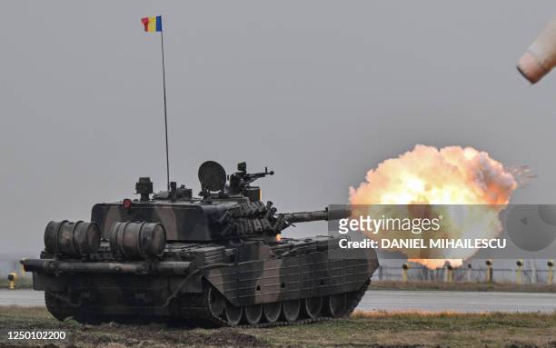 Romanian-made tank TR-85 'Bizonul' fires during a demonstration as part of the rotation of US troops of the US Army 101 Airborne division at Mihail...