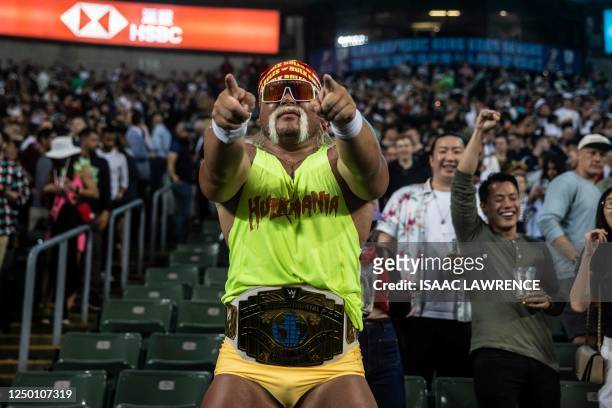 Man dressed as former wrester Hul Hogan attends the first day of the Hong Kong Sevens rugby tournament on March 31, 2023.