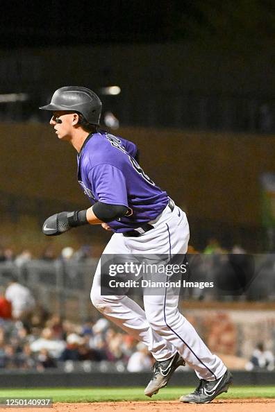 Drew Romo C Drew Romo of the Colorado Rockies takes a lead at first base during ...