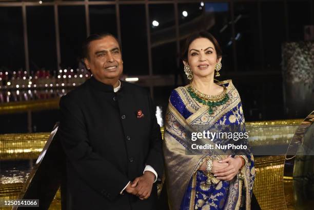 Indian billionaire businessman Mukesh Ambani and his wife Nita Ambani poses for a photograph on the first day of the openings of Nita Mukesh Ambani...