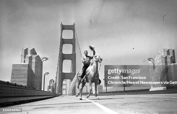 Film envelope titled 'freak first day crossings of the Golden Gate Bridge' with the Marin Headlands in the background sometime before opening, May...