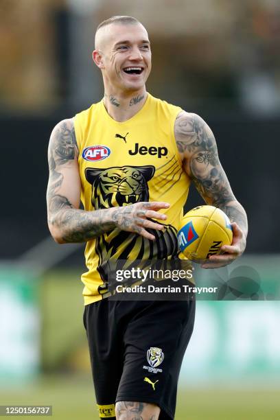 Dustin Martin of the Tigers laughs during a Richmond Tigers AFL training session at Punt Road Oval on June 17, 2020 in Melbourne, Australia.