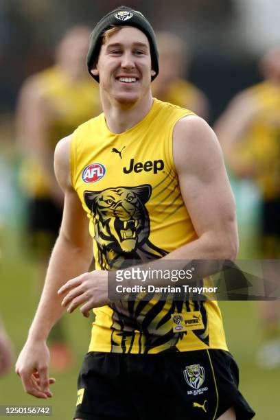 Tom Lynch of the Tigers laughs during a Richmond Tigers AFL training session at Punt Road Oval on June 17, 2020 in Melbourne, Australia.