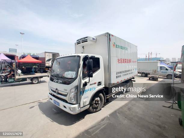 Truck delivering vegetables to Beijing sits parked at Hebei Xinfadi agriculture products wholesale market, which belongs to Beijing Xinfadi Market,...