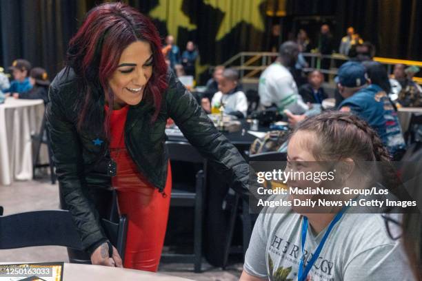 Universal City, CA WWE star Bayley spends some time with Make-A-Wish kid Ariyah McLaughlin during an event for 20 Make-A-Wish kids and families at...