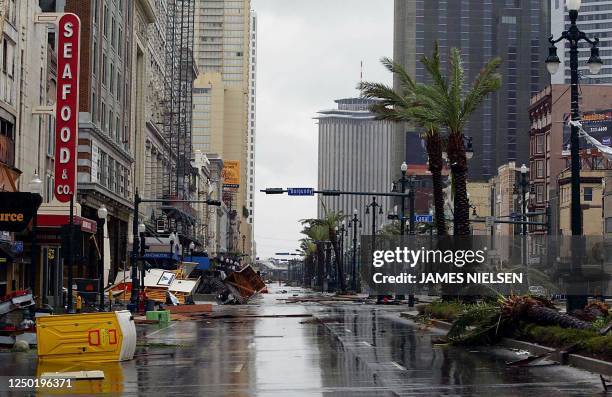 Debris are scattered across Canal street in the French quarter of New Orleans, 29 August 2005, as Hurricane Katrina makes landfall. Hurricane Katrina...
