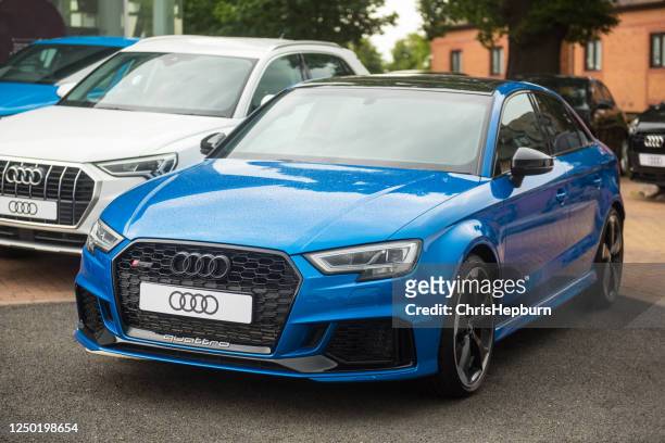 audi rs3 saloon in ara blue paint - stationery elegant stock pictures, royalty-free photos & images