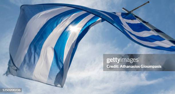 Greek flag at the Medieval Castle of Skiathos on June 13, 2020 in Skiathos, Greece.