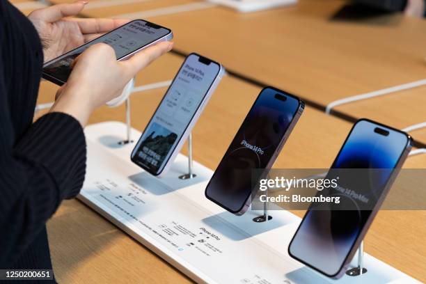 Apple Inc. IPhone 14 smartphones at the company's store in the Gangnam District of Seoul, South Korea, on Friday, March 31, 2023. Apple has enlisted...