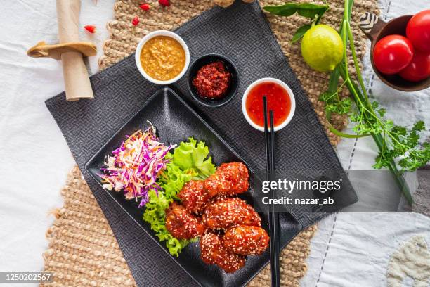korean fried chicken. - korean fried chicken stock pictures, royalty-free photos & images
